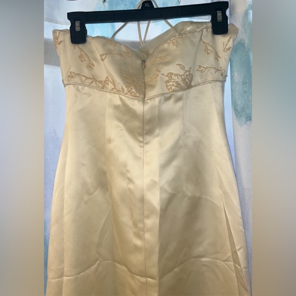 Ivory/cream dress with spaghetti straps and a zipper in the back. Gently used. - Picture 6 of 11